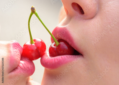 Lesbo couple tongue kissing in closeup